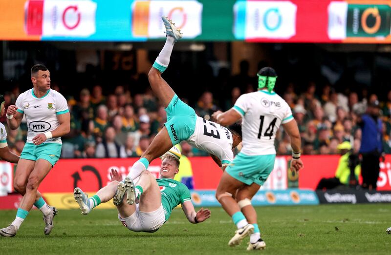 Ireland's Jamie Osborne and South Africa's Sacha Feinberg-Mngomezulu clash during the second Test at Durban. Photograph: Dan Sheridan/Inpho 