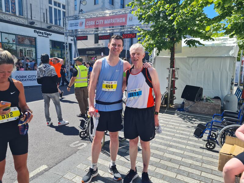 Eamonn Dunne and his father Michael who crossed the finish line together. Eamonn after completing his first marathon and veteran marathon runner Michael after completing the Half Marathon. Photograph: Barry Roche