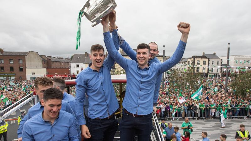 Diarmuid Byrnes and Declan Hannon with the Liam MacCarthy Cup   after Limerick’s winning All Ireland hurling team arrived back in the city on Monday. Photograph:  Sena Curtin True Media.