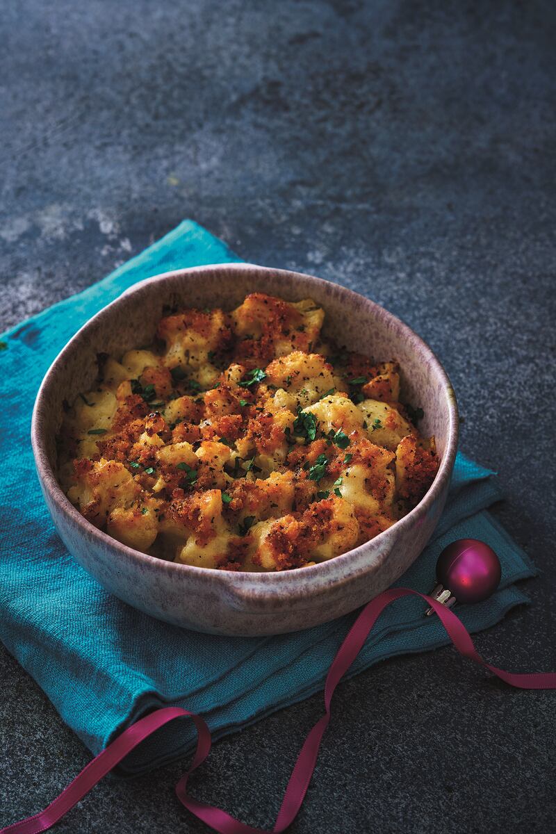 Cheat a little by serving this creamy cauliflower cheese with Parmesan and truffle oil, one of the many pre-prepared side-dishes you can buy from the Deluxe range at Lidl
