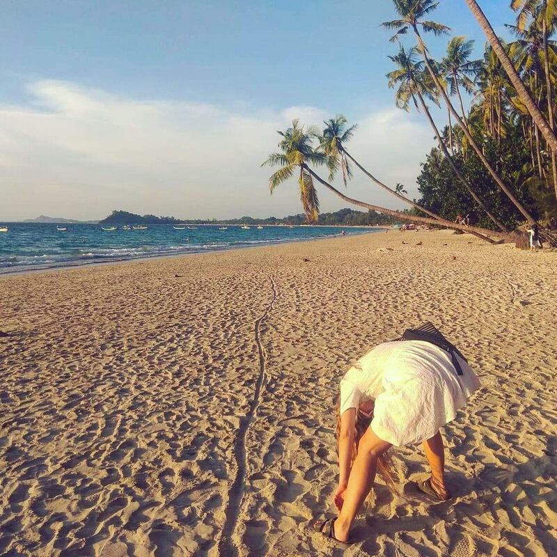 Fiona Hyde beachcombing on Ngapali Beach in Myanmar