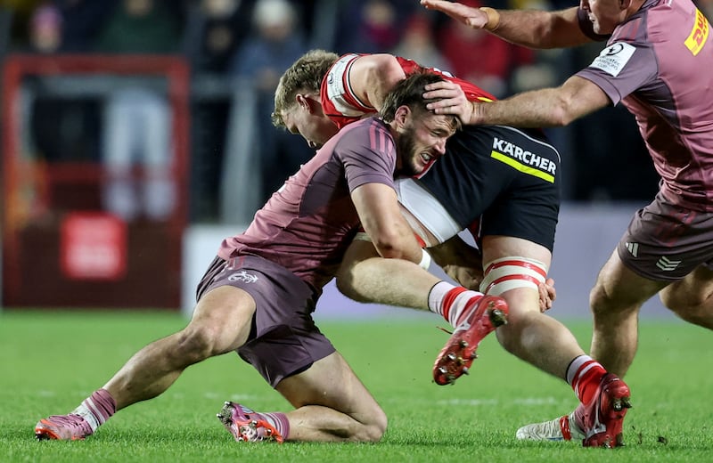 Munster's Alex Nankivell makes a tackle at Páirc Uí Chaoimh. Photograph: Dan Sheridan/Inpho