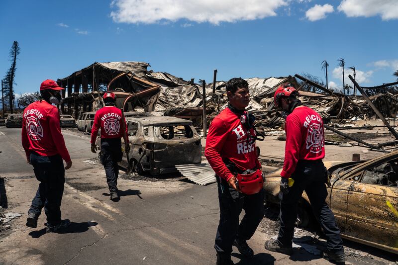 Honolulu Fire Department responders in Lahaina two days after it was devastated by wildfire. Photograph: Go Nakamura/New York Times
                      