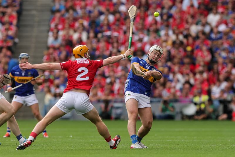 Tipperary's Darragh McCarthy takes on Cork's Niall O'Leary. Photograph: Morgan Treacy/Inpho