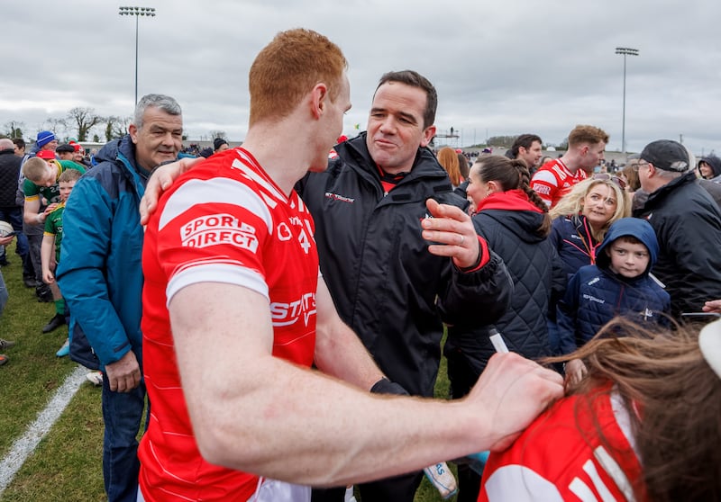 Louth manager Ger Brennan celebrates with Donal McKenny after victory against Meath earlier this year in the National League. James Crombie/Inpho