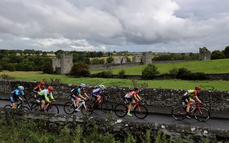 The peloton passes Kells Priory during stage two of the Rás na mBan  from Kilkenny to Inistioge. Photograph: Lorraine O'Sullivan