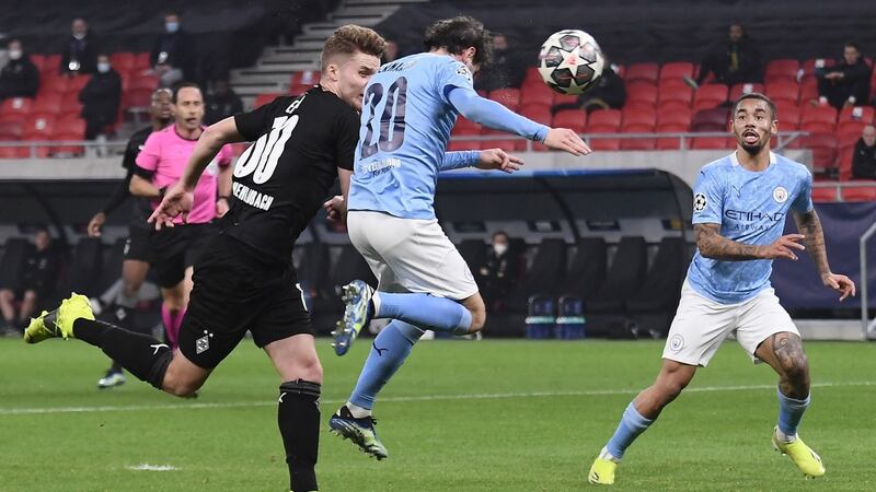 Manchester City’s  Bernardo Silva scores his team’s first goal during the  Champions League last 16 first-leg game against  Borussia Mönchengladbach at the Puskas Arena in Budapest. Photograph: Attila Kisbenedek/AFP via Getty Images