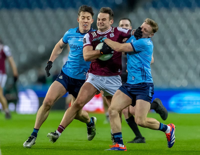Dublin’s Killian McGinnis and Cian Murphy with Cillian McDaid of Galway. Photograph: Morgan Treacy/Inpho