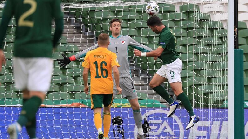 Shane Long heads over from a good Ireland chance. Photo: Donall Farmer/AFP via Getty Images