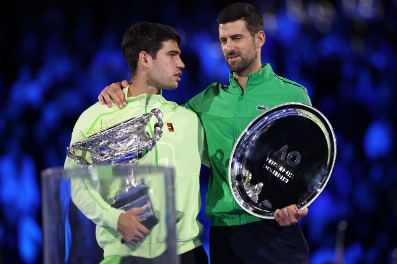 Carlos Alcaraz and Novak Djokovic after the Australian Open's men's singles final. Photograph: Clive Brunskill/Getty Images