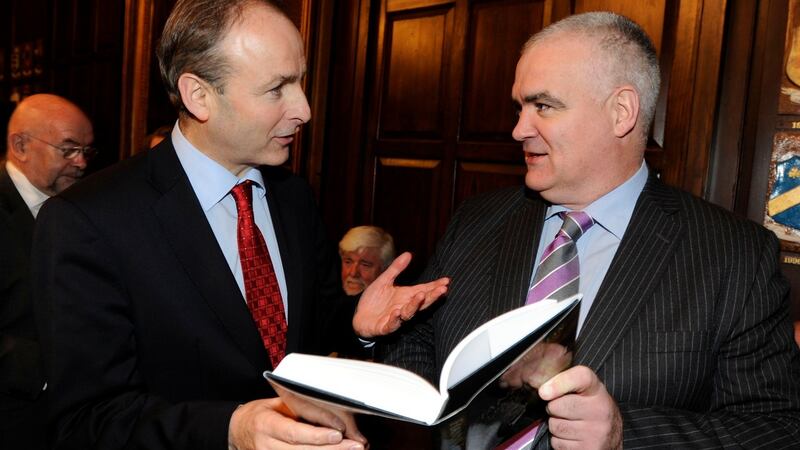 Pictured in 2011 at the launch of his  book, Fianna Fail: A Biography of the Party,  is author Noel Whelan (right)  with Fianna Fáil leader  Micheál Martin. Photograph: The Irish Times