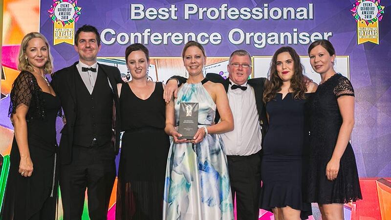 Declan Maxwell, Restaurant Manager, Luna Restaurant presents the Best Corporate Entertainer award to Chantal McCormick & Emma Poole, Fidget Feet Aerial Dance Theatre.