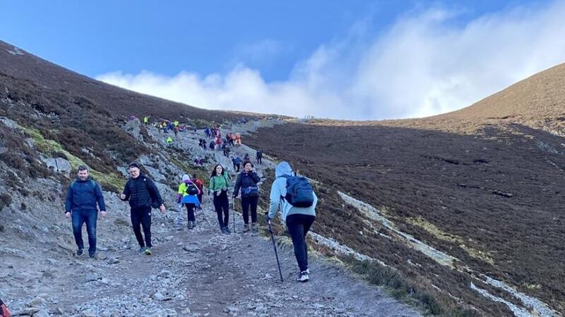 People hiking up Croagh Patrick in Co Mayo on Saturday as part of the Climb with Charlie fundraiser, which has raised more than €1 million for the Irish Motor Neurone Disease Association and suicide charity Pieta. Photograph: Mark Hennessy