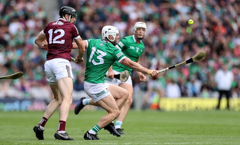 Galway’s Joseph Cooney with Aaron Gillane of Limerick. Photograph: James Crombie/Inpho