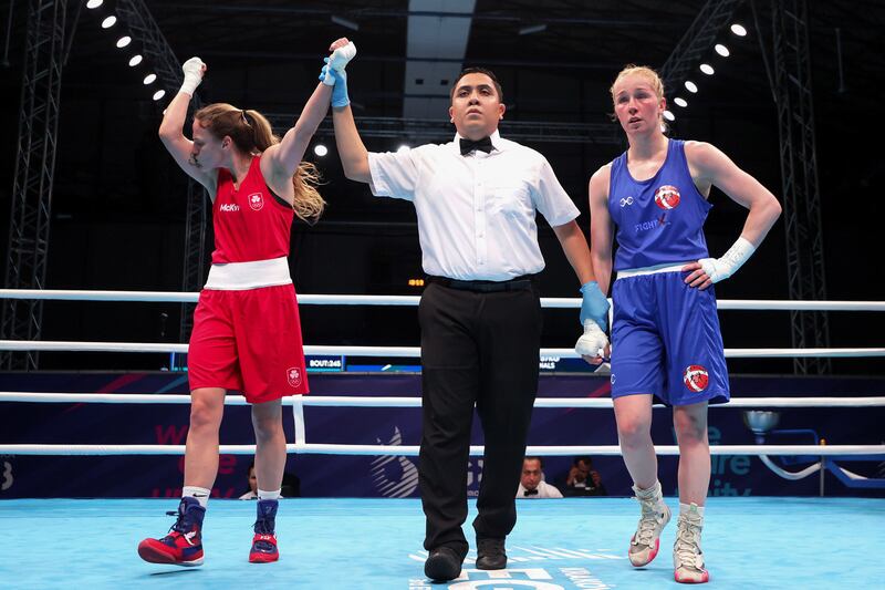 Ireland’s Michaela Walsh celebrates her victory over Denmark's Melissa Mortensen in their featherweight quarter-final at the European Games at the Nowy Targ Arena in Poland. Photograph: Laszlo Geczo/Inpho