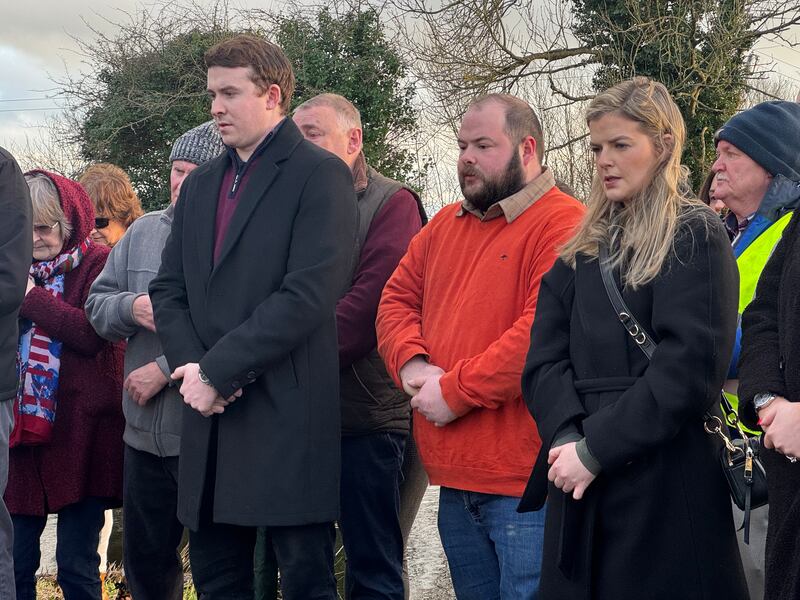 (From left) Ashling Murphy's boyfriend Ryan Casey, her brother Cathal Murphy and sister Amy Murphy at a commemoration gathering on the fourth anniversary of Ms Murphy's murder in Tullamore, Co Offaly. Photograph: Bairbre Holmes/PA Wire 