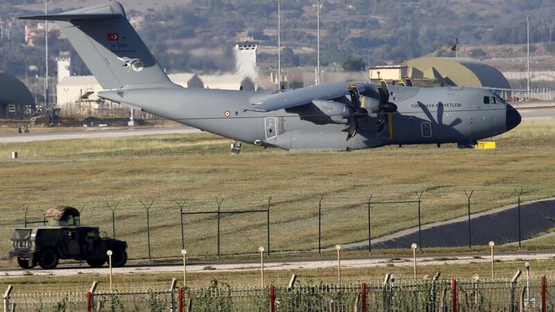 A Turkish Air Force  transport aircraft is parked at Incirlik airbase in the southern city of Adana. Turkey has agreed to allow US planes to launch air strikes against Islamic State militants from the US air base at Incirlik, close to the Syrian border, US defence officials said. Photograph: Reuters