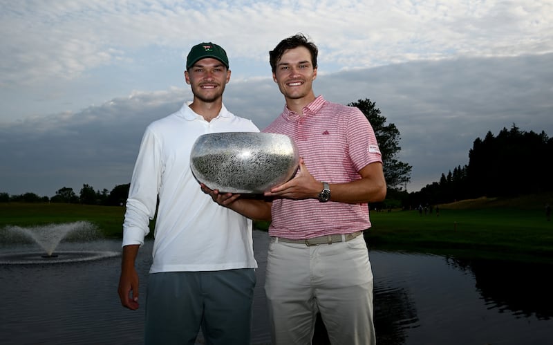 Rasmus Hojgaard (right) poses with his brother Nicolai after his win in the Made in HimmerLand tournament at Himmerland Golf & Spa Resort in Denmark in 2023. Photograph: Octavio Passos/Getty Images