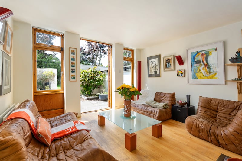 Living room opens to the courtyard