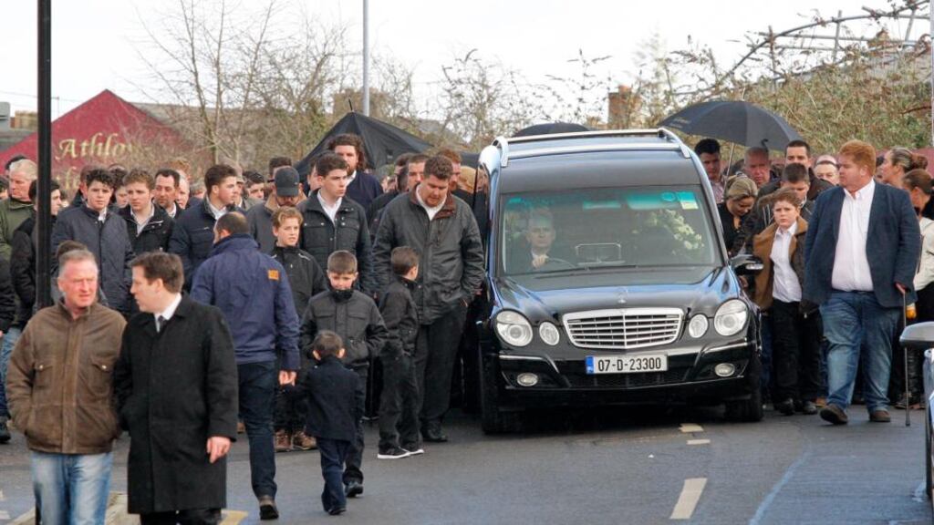 Final journey: The funeral cortege of Barney McGinley, who was killed in the village of Newtownbutler in Co Fermanagh, after his funeral Mass at St Mary’s Church, Athlone. Photograph: Colin Keegan/Collins Dublin.