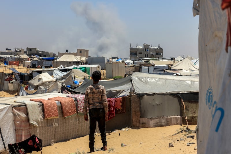 Smoke billows in the distance during an Israeli bombardment of Rafah, in the southern Gaza Strip on Wednesday. Photograph: AFP/Getty Images