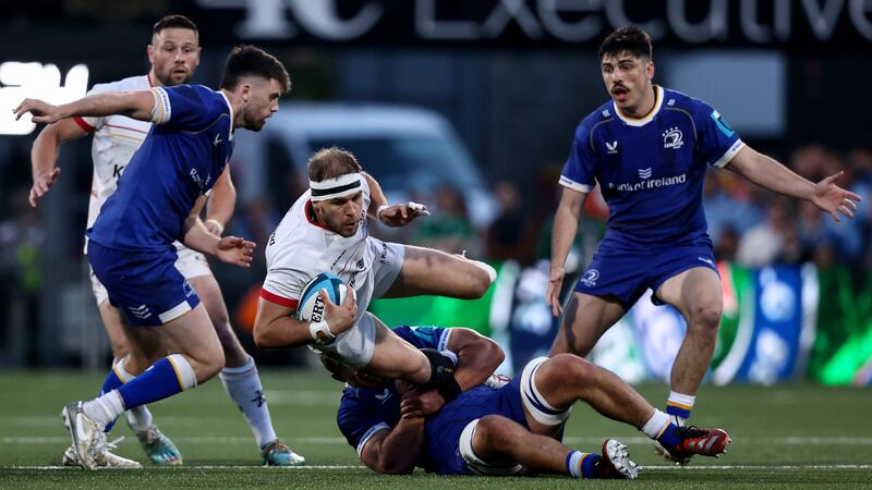 Ulster's Will Addison is tackled by Scott Penny of Leinster during the URC clash at Kingspan Stadium. Photograph: Ben Brady/Inpho 