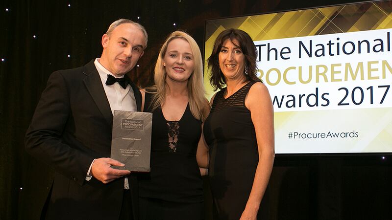 Lisa O' Carroll, Business Development Leader, FCM Travel Solutions presents the Innovation Award to Sinead Duffy & Kevin Fisher, Pfizer Grange Castle.