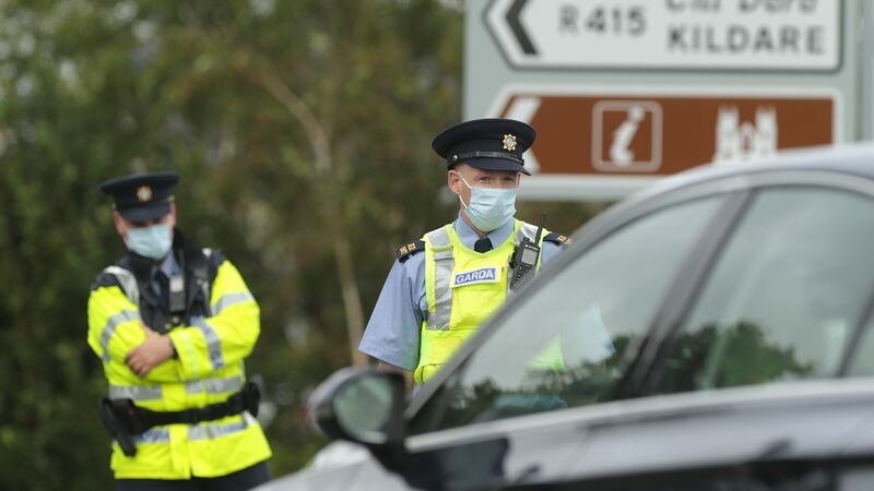 Garda question motorists at the roundabout before entering Kildare village Shopping Village. Photograph: Damien Eagers