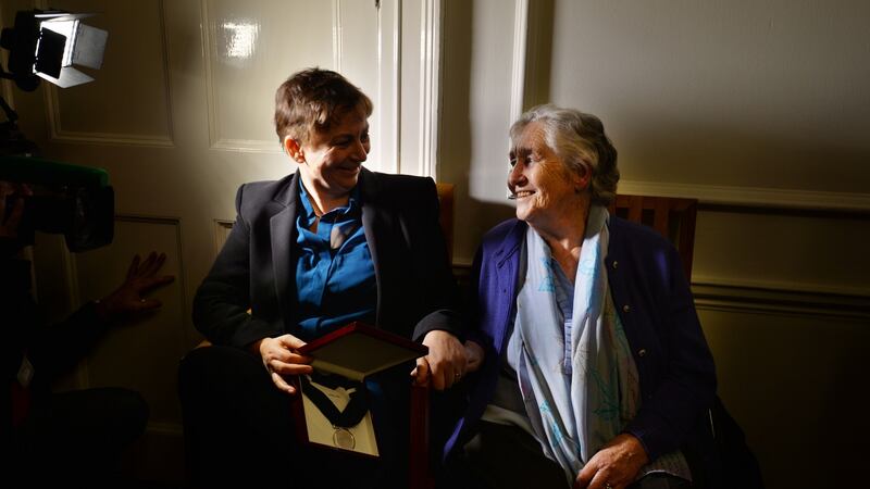 Anne Enright, at her  inauguration as the first Laureate for Irish Fiction,  with her mother Cora. Photograph: Alan Betson
