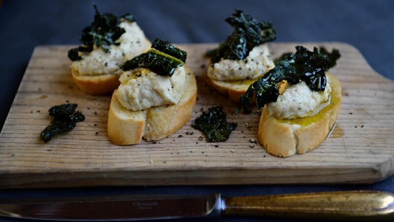 Crostini with white beans and roasted kale. Photograph: Cyril Byrne