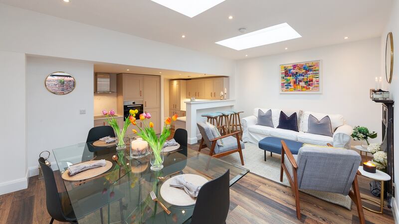The living-cum-diningroom is exceptionally bright