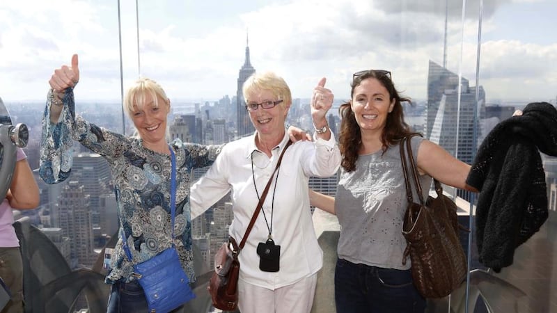 Lottery trip  winners Suzy Madigan and her mother Christina Madigan from Cratloe, Co Clare, pictured with Christina’s  daughter Jenny, visiting from Portland, Oregan enjoying the view of Manhattan from the  Observation Deck at the Rockefeller Centre