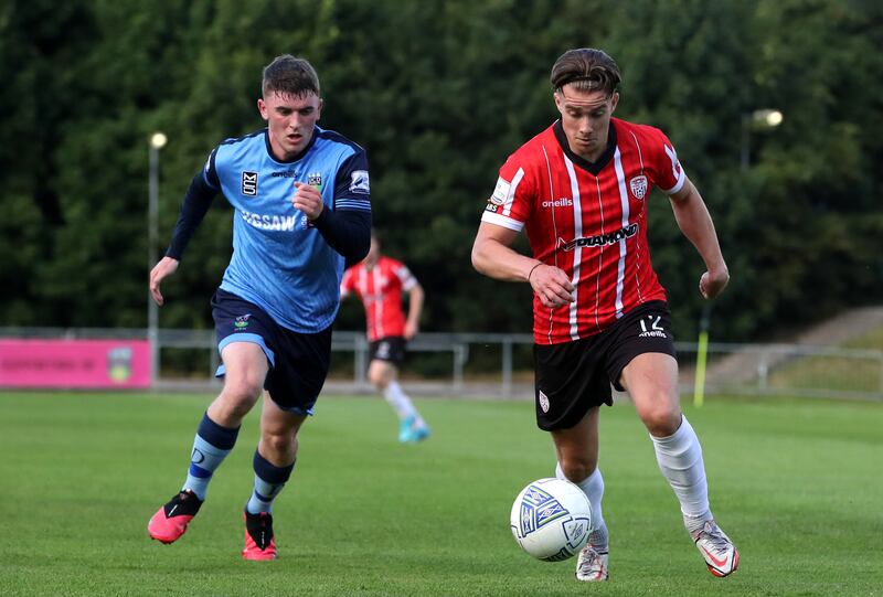 UCD’s Michael Gallagher and Matty Smith of Derry City. Photograph: Bryan Keane/Inpho