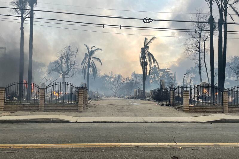 Homes have been destroyed in the fires, which firefighters are battling to control. Photograph: EJ Soto/AP