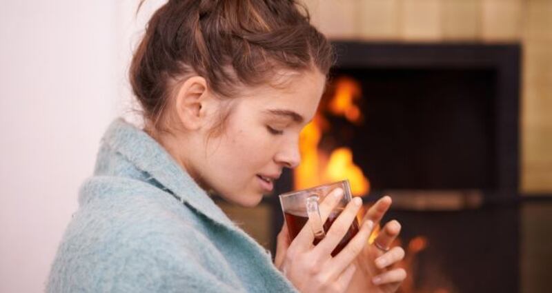 Candles are instant hygge, as are fireplaces, hot chocolate, and as many blankets as you can carry away from Ikea