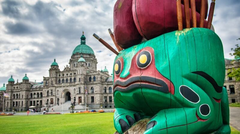 The Knowledge Totem is an Indian totem, carved by the Cowichen tribes,  in front of the British Columbia Parliament building. Photograph: Getty Images