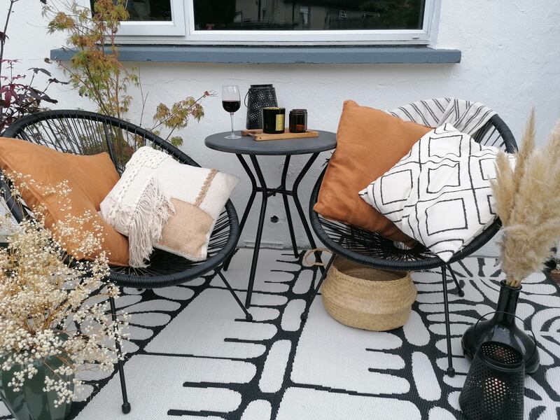Jysk lounge set with H&M cushions, styled by Celine Gill. 