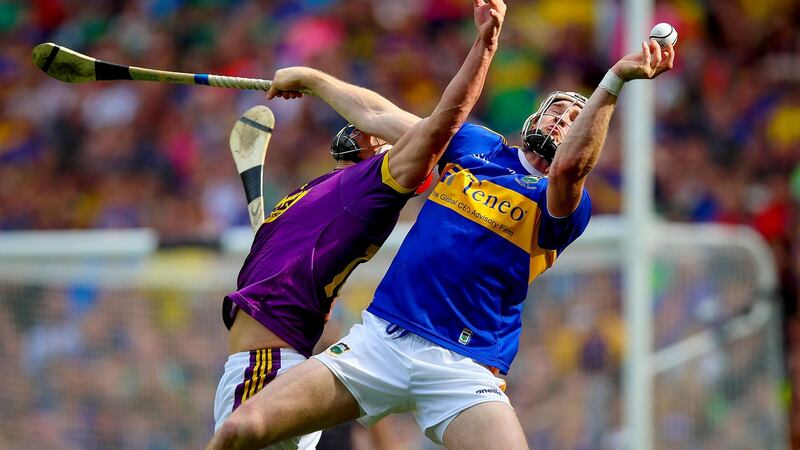 Wexford’s Lee Chin with Tipperary’s Brendan Maher. Photograph: Tommy Dickson/Inpho