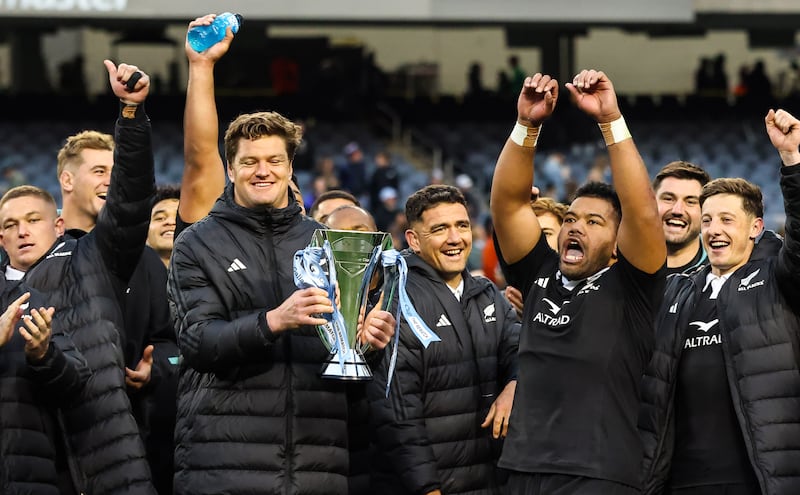 New Zealand’s Scott Barrett lifts the Gallagher Cup. Photograph: Gary Carr/Inpho