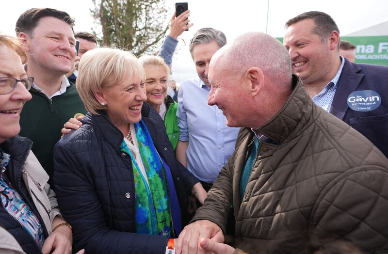 Presidential candidates Heather Humphreys and Jim Gavin speak to each other while canvassing at the National Ploughing Championships in Co  Offaly on Tuesday. Photograph by Niall Carson/PA Wire
