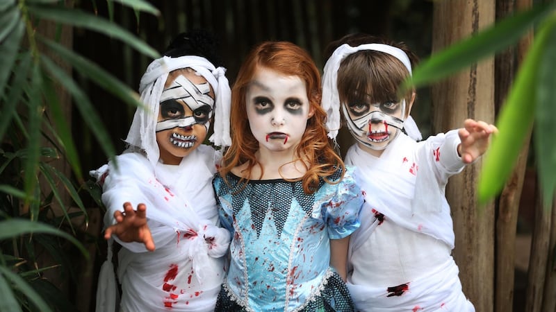 Joy O’Brien Awesu (age 6 from Tallaght), Molly White (age 6 from Phibsborough) and Eric Moore (age 6 from Rialto) in the National Botanic Gardens Glasnevin at the the launch of the Bram Stoker Festival. Photograph: Sasko Lazarov/Photocall Ireland
