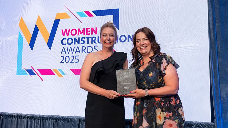 Lizette Conneely, awards judge, presents the best operations leadership award to Breda Gleeson, FKM Fit Out