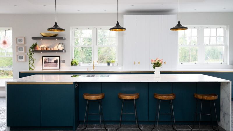 The kitchen has lots of prep space and under-counter storage, while the sink and a wall of low cabinets runs parallel to optimise the work triangle. Photograph: Tom Honan