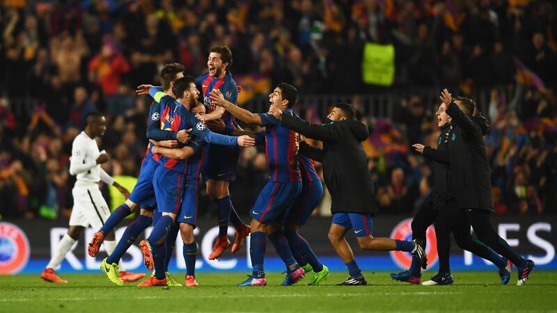 Barcelona players celebrate victory after beating Paris St-Germain in the Champions League last 16. Photo: Laurence Griffiths/Getty Images