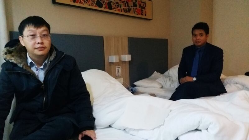 Yan Xin (left) and Ge Yongxi, lawyers for activist Wu Gan, sit at a hotel after Mr Wu was sentenced at a court in Tianjin on December 26th, 2017. Photograph: Joanna Chiu/AFP/Getty Images