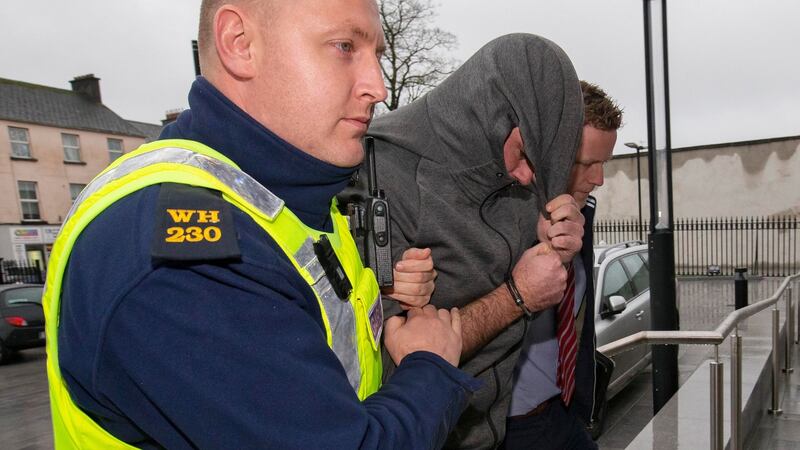 John Joyce (centre, wearing grey hoodie)pictured arriving at Mullingar District Court. Photograph: Colin Keegan, Collins Dublin