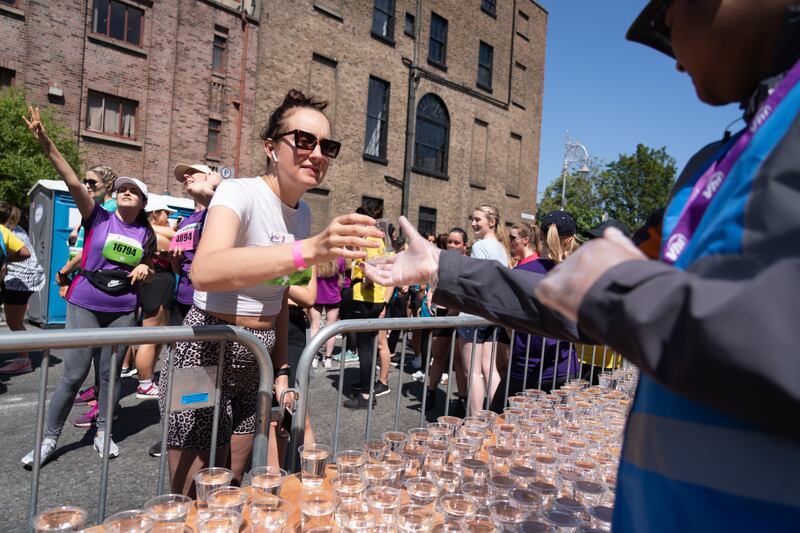 A participant getting some water. Photograph:Barry Cronin/ The Irish Times