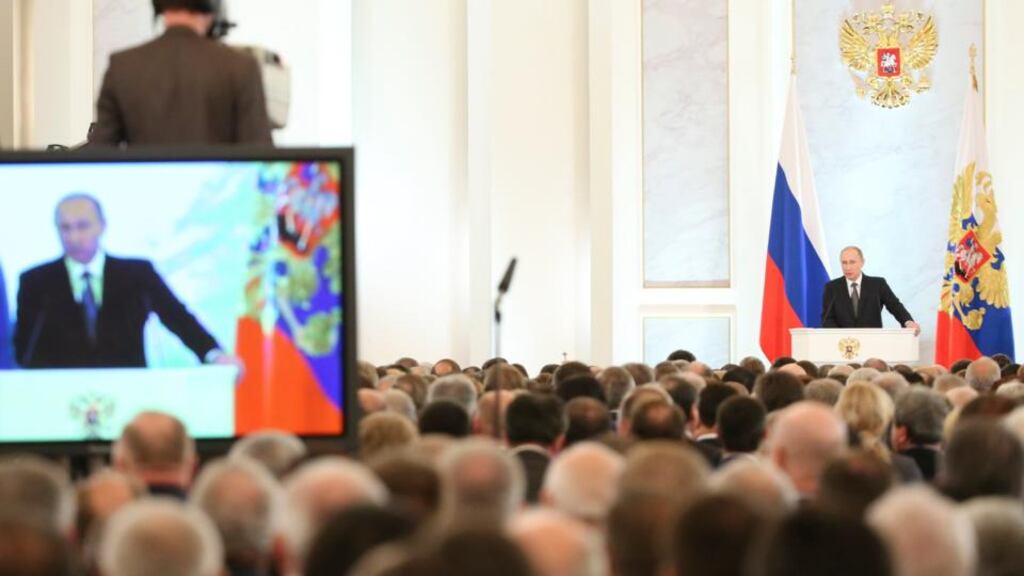 ‘Vladimir Putin’s authoritarian profile has been sharply ratcheted up this year, pursuing critics and opponents into an expanding gulag of political prisons.’  Above, Putin addresses the Federal Assembly, at the Kremlin in Moscow, this week. Photograph: Sergei Karpukhin/Reuters