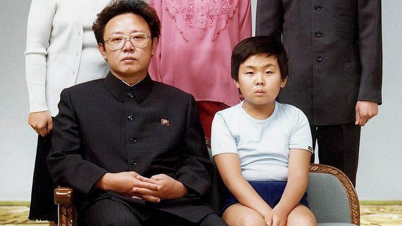 Former North Korean leader Kim Jong-Il  (l) with his son, Kim Jong-Nam (R) sitting for a family portrait in Pyongyang, in August 1981.  File photograph: AFP/Getty Images