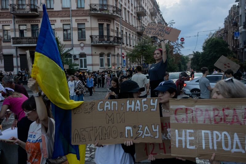 A demonstration in Kyiv on Tuesday calls for a veto of a law that reduces the powers of anti-corruption agencies. Photograph: Tetiana Dzhafarova/AFP